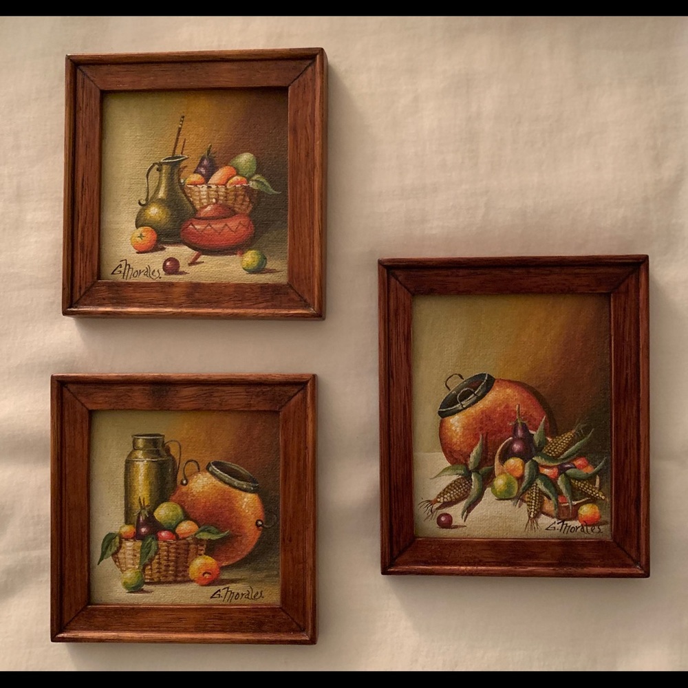 Three still-life oil paintings.